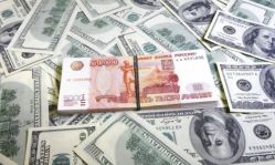 Биржевой курс доллара опустился ниже 53 рублей